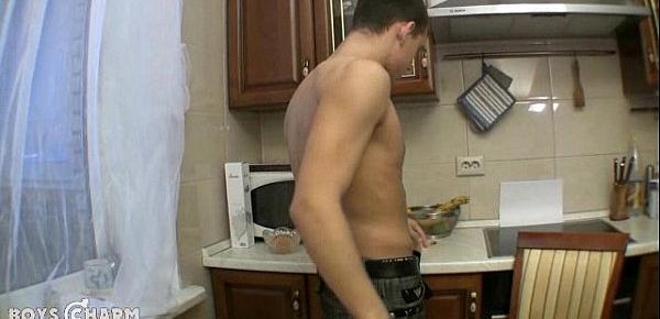  Cute boy gets naughty with a banana in the kitchen